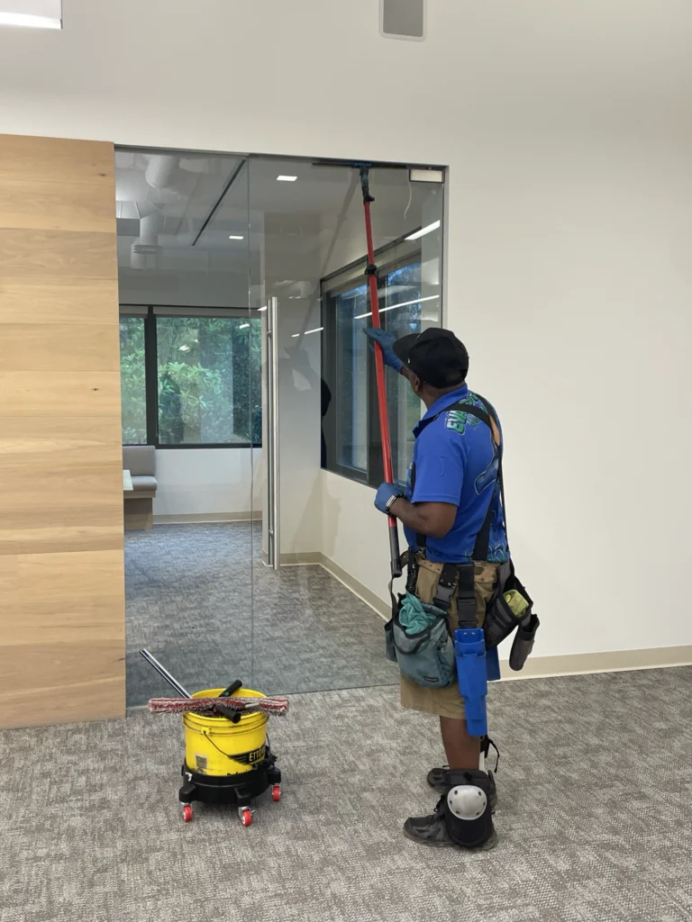 Evans Dynamic team cleaning interior commercial windows